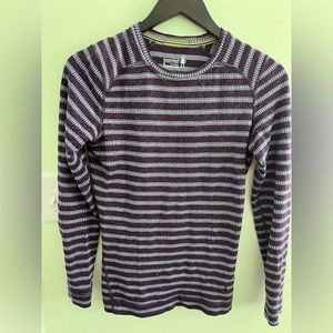 This Smartwool shirt will keep you warm and can be worn as a top or base layer.